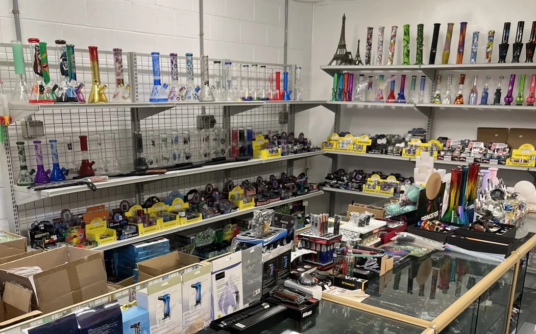 Customs says large numbers of knives and drug paraphernalia were found in the couple's home....