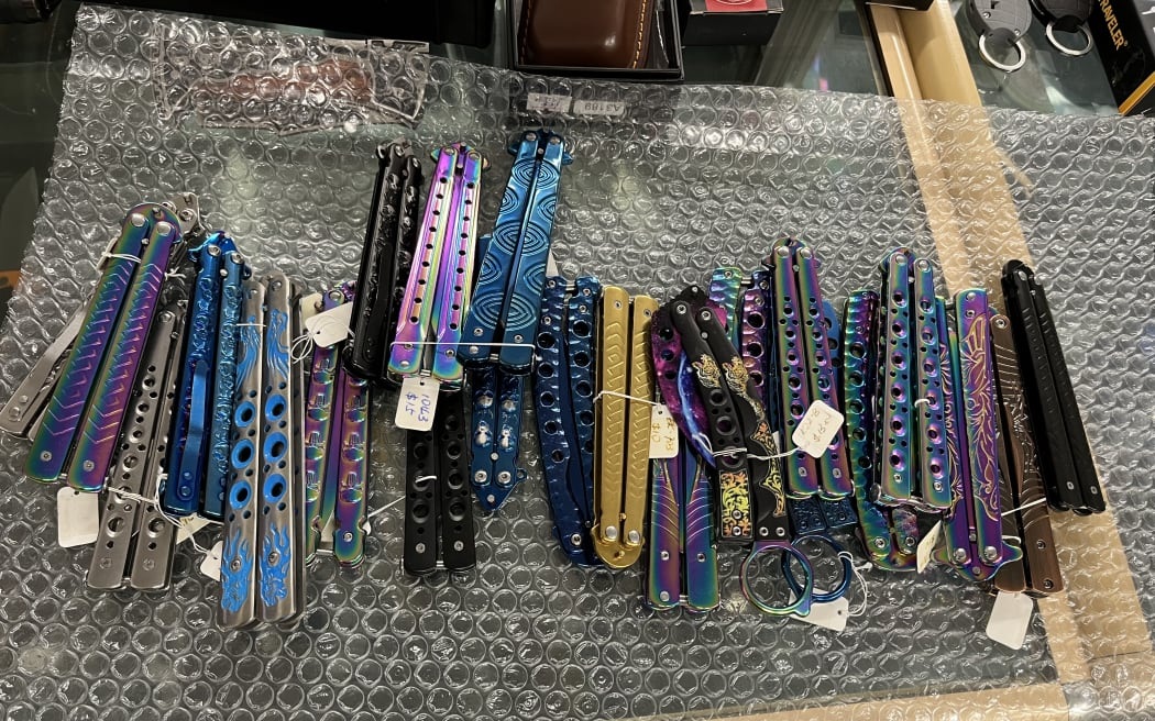 Investigators searching the couple's home in June 2025 found large numbers of flick knives ...