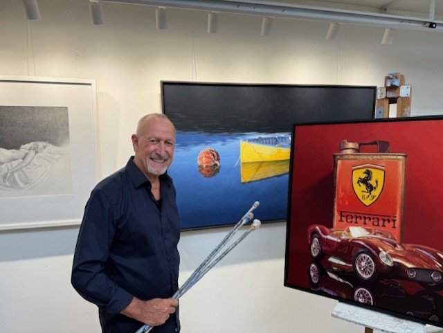 Adam Portraiture Award 2026 finalist Geoffrey Williams with his late father's mahl sticks — he...