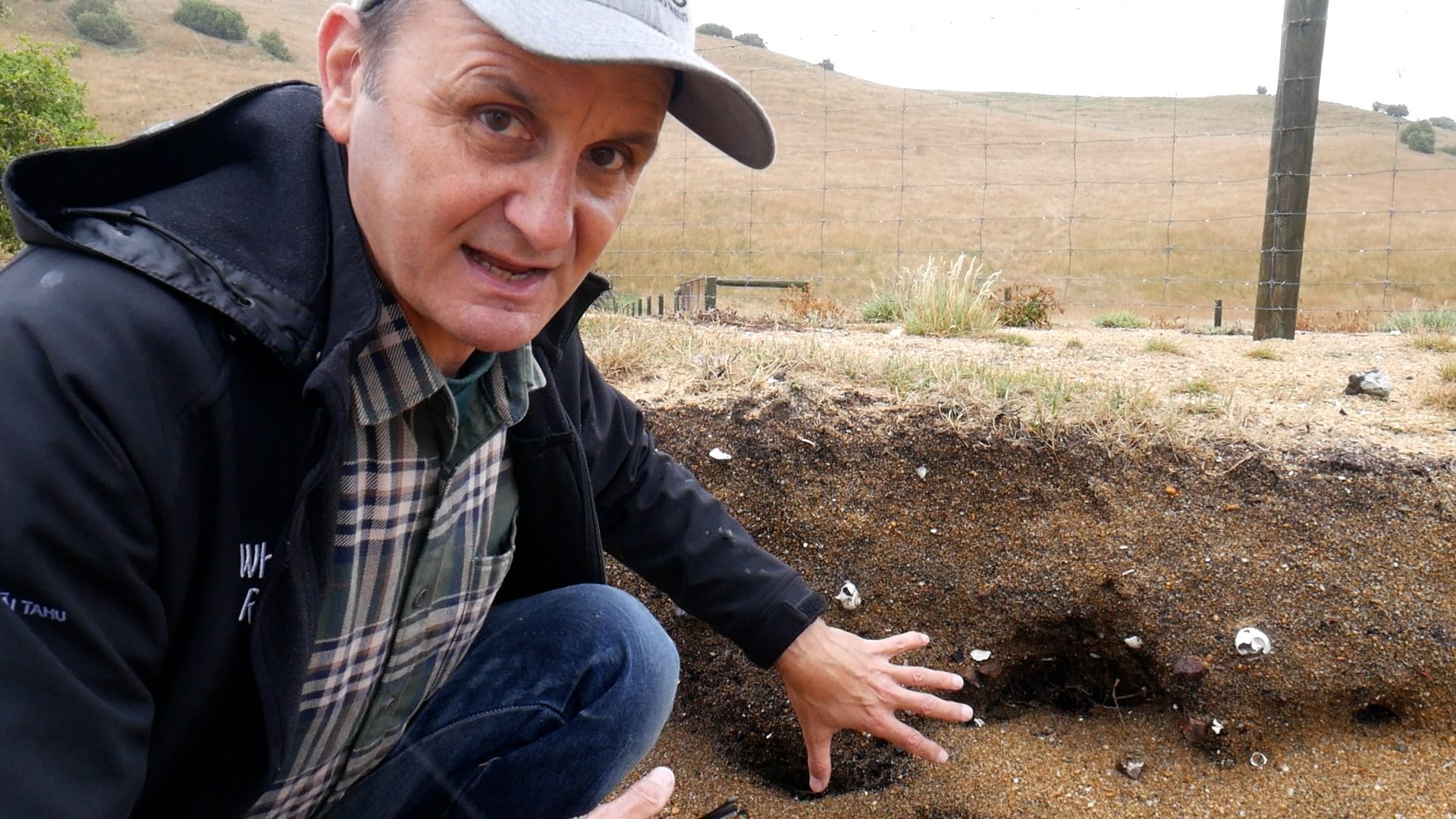 Gerard O’Regan with some earth oven middens, exposed at the high-tide line.