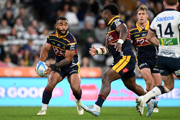 Jona Nareki looks to pass to Highlanders teammate Timoci Tavatavanawai during Saturday's match....
