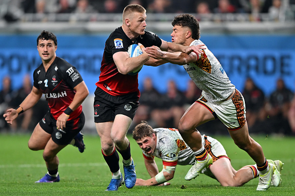 Crusaders winger Johnny McNicholl runs the ball up against the Chiefs. Photo: Getty Images