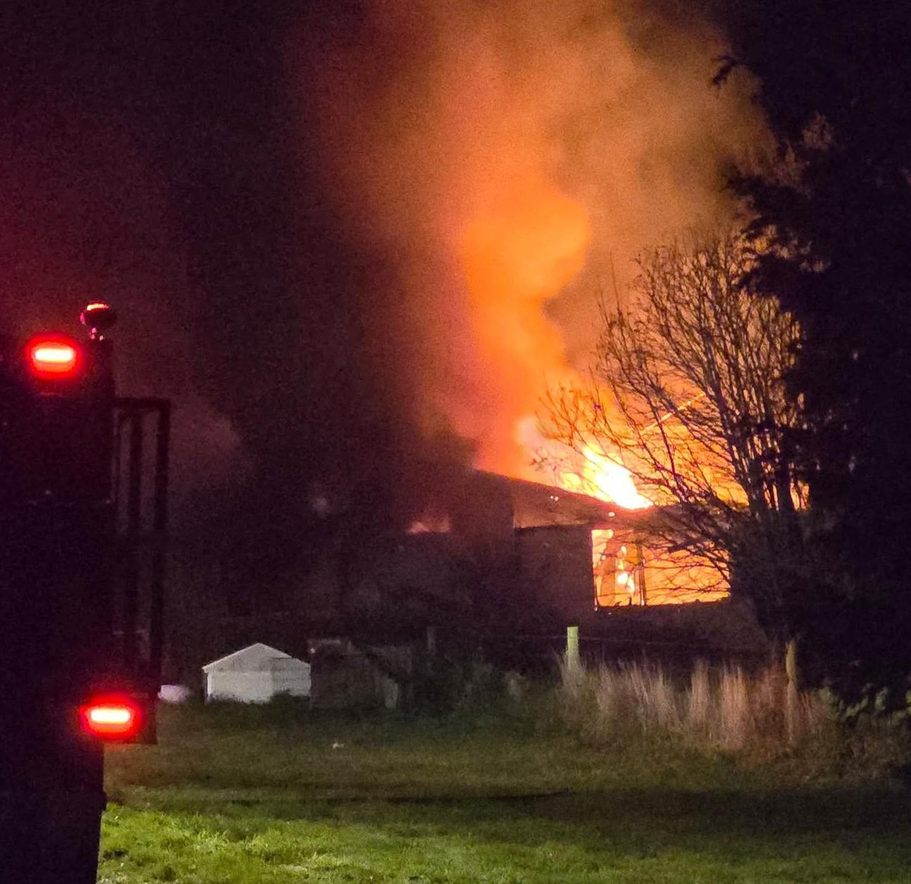 The Roman family’s rural Southland home in Raymonds Gap is engulfed in flames.