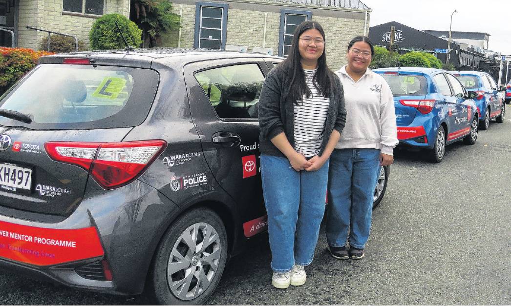 Angelica, left, and Erica Vargas before they headed off on their successful driving tests. Photo:...