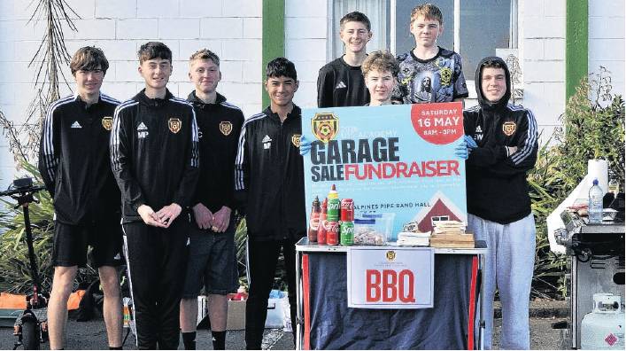 Members of the Waimak United Football Club’s U15 Academy team who helped run a barbecue during...