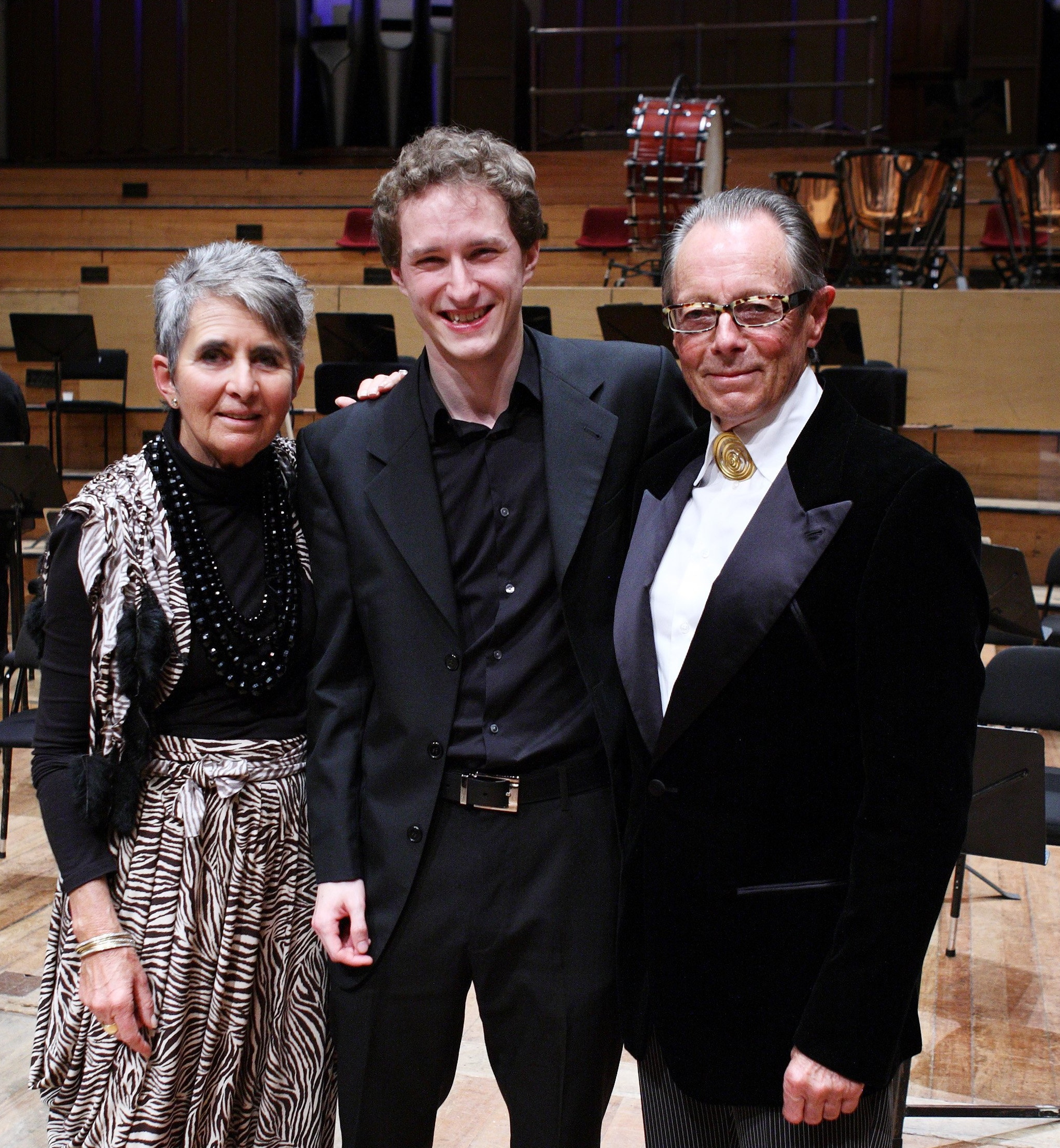 Czech violinist Josef Spacek with Sir Michael Hill and Christine Hill after his win in the 2009...