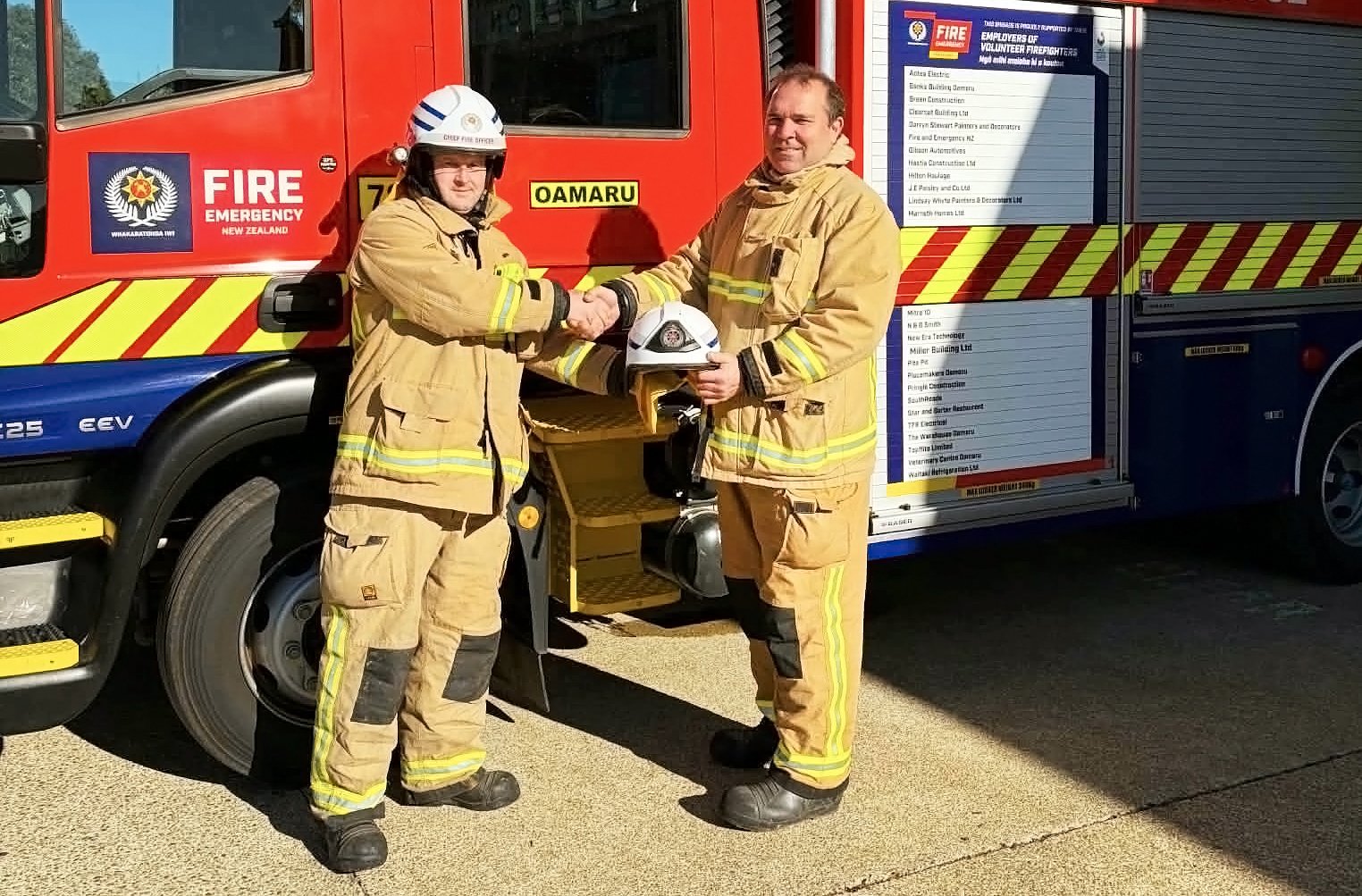 Newly appointed Oamaru Volunteer Fire Brigade Deputy Chief Fire Officer Tane Rogers (right) is...