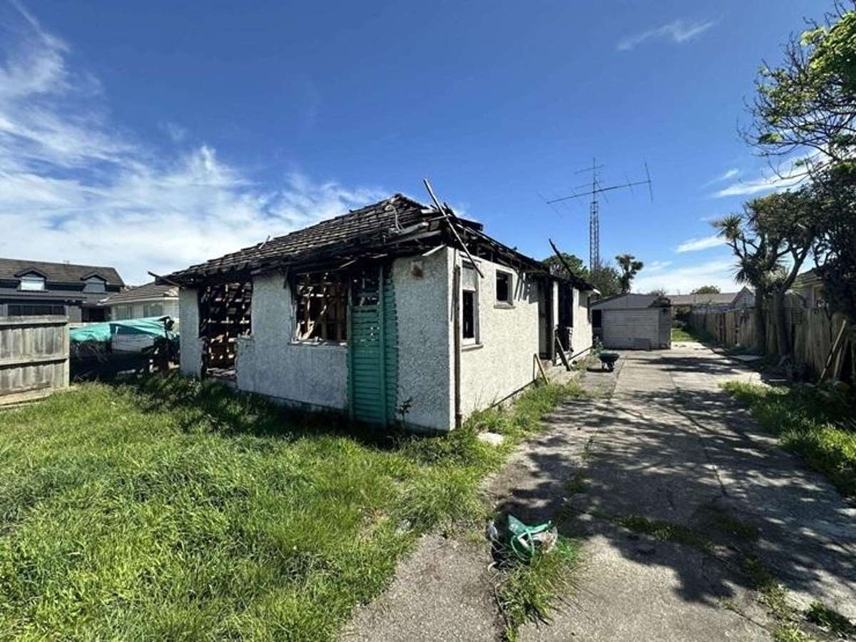 The burnt-out property at 104 Estuary Rd, South New Brighton. Photo: Supplied