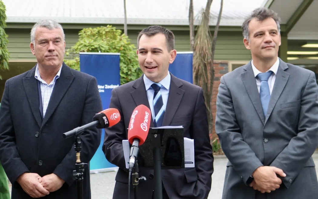 Waitaki MP Miles Anderson (L), Health Minister Simeon Brown (C) and Southland MP Joseph Mooney at...