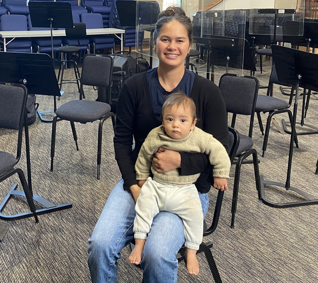Dunedin Symphony Orchestra principal second violin Ngaruaroha Martin holds son Hono-Dean Smiler...