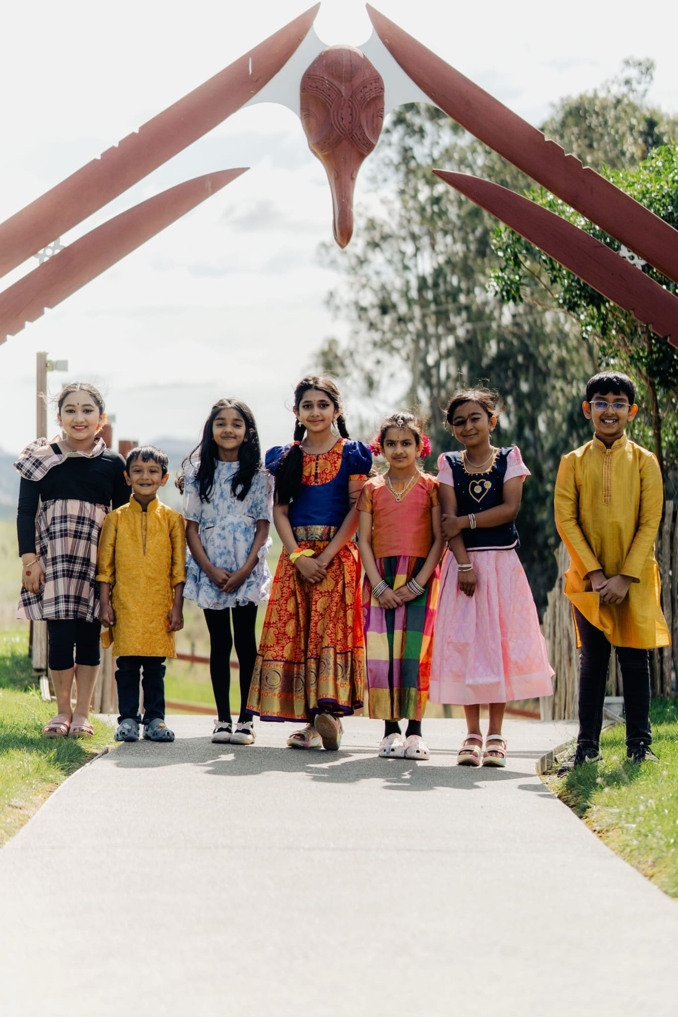 Gathering at Puketeraki Marae recently wearing traditional attire are young members of the Tamil...