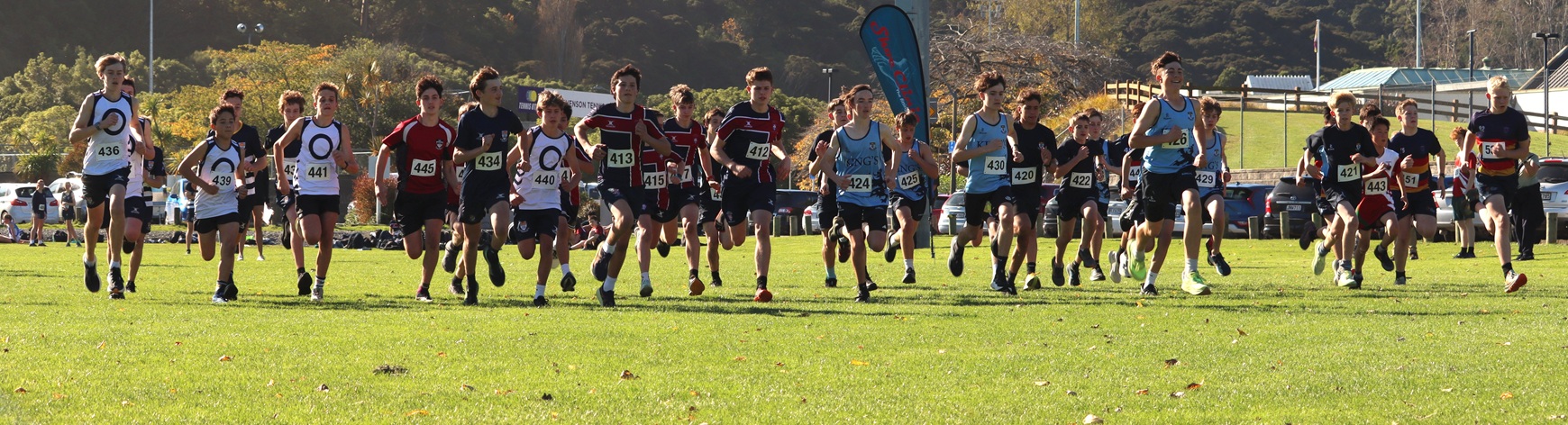 Junior boys set off at the start of the Logan Park road race. 
