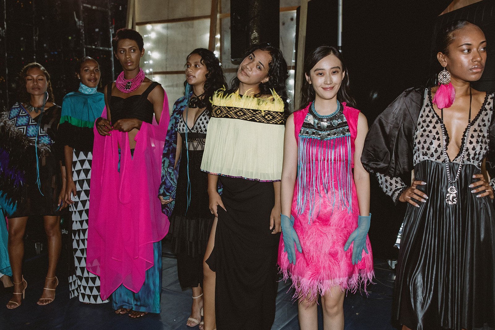 Models from Fiji and beyond lineup backstage in Bridgman’s collection.