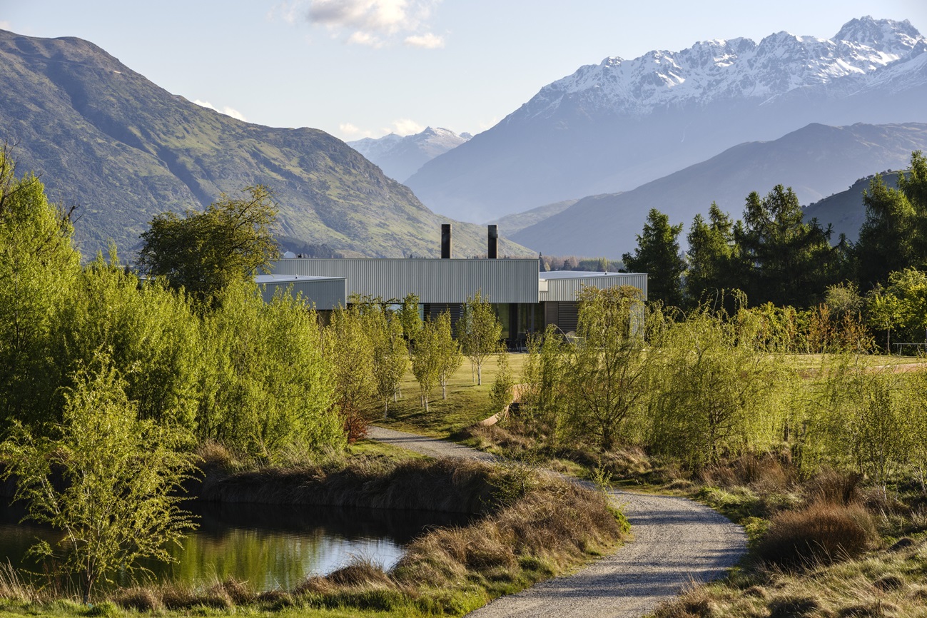 Sited in the foothills of The Remarkables, the house is detailed like a refined rural shed....