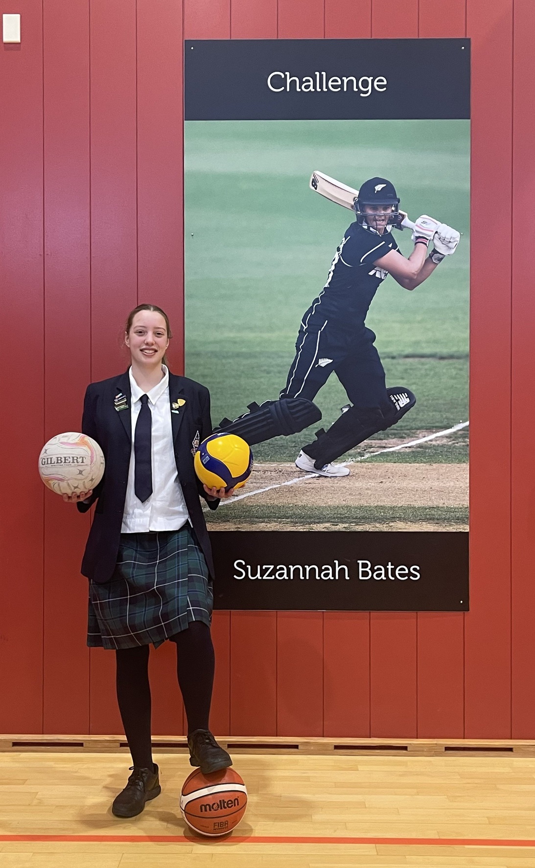 Eva Gardner (Otago Girls’ High School) looks to one of her school’s sporting greats, Suzie Bates,...