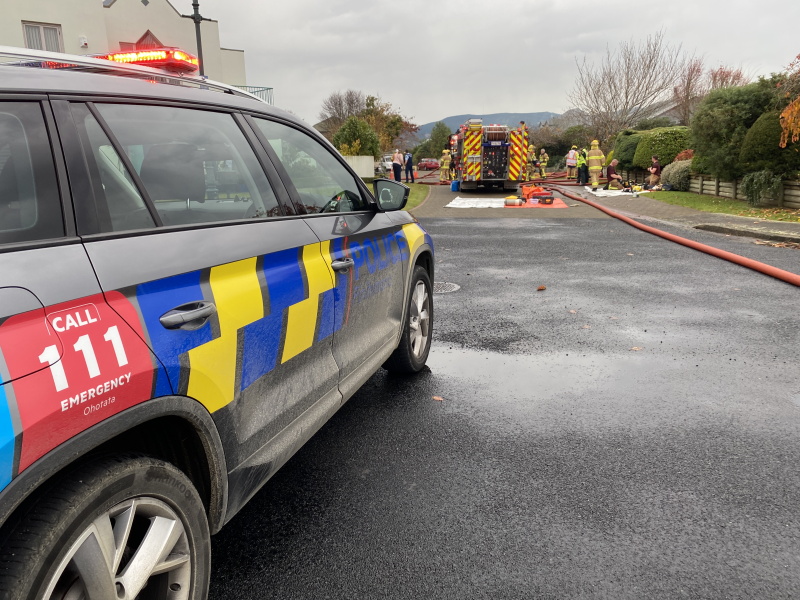 Emergency services respond to a house fire in Mosgiel this afternoon. Photo: Peter McIntosh