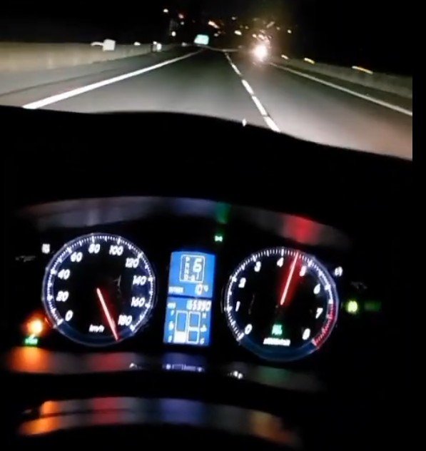 A screenshot from a TikTok account featuring a youth driving a car at more than 200kmh down the...