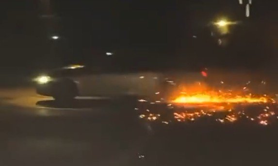 A screenshot from a TikTok account featuring a youth stealing cars and damaging them across...