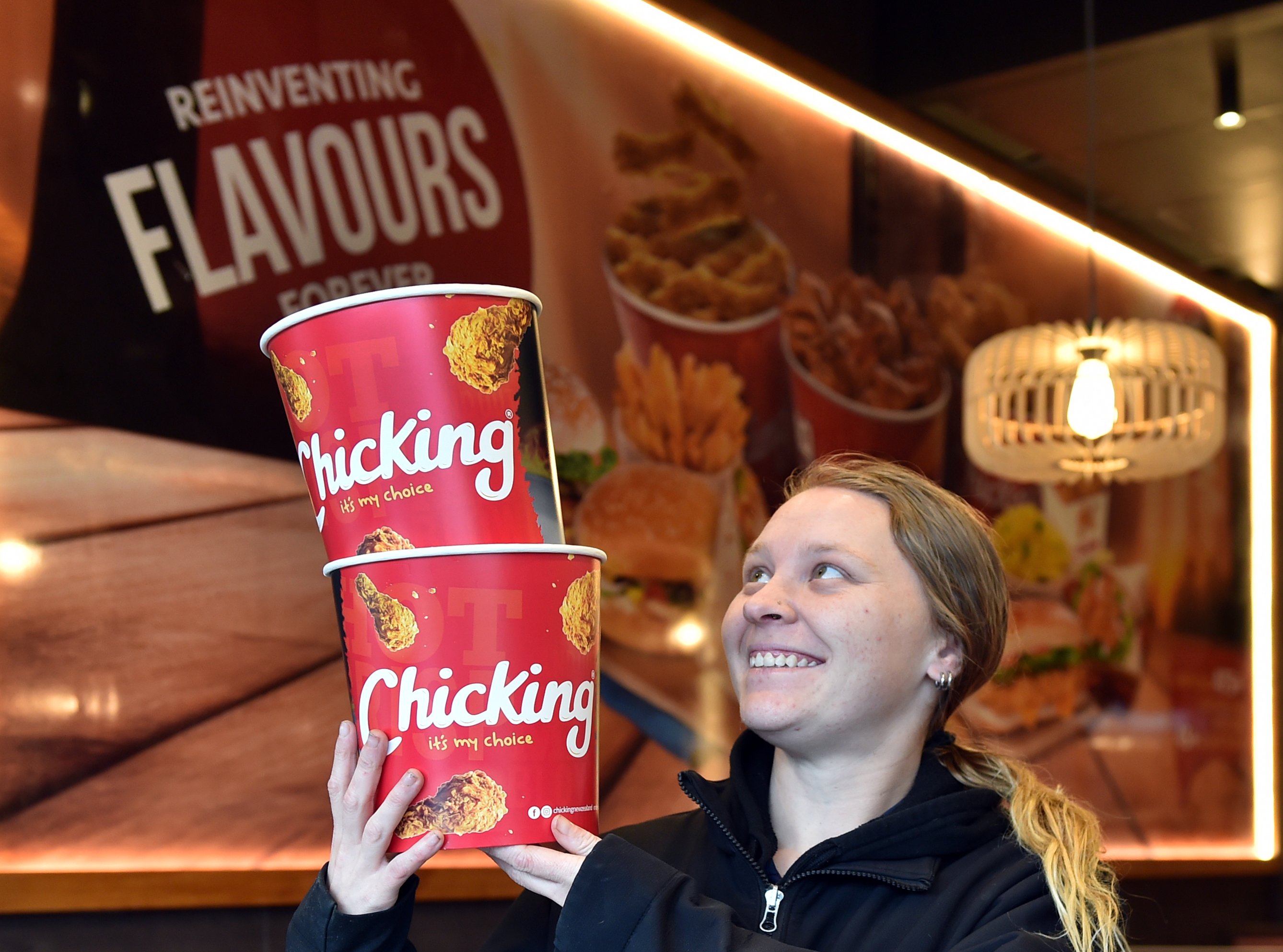 Chicking Dunedin opening manager Sabrina Hardy helps prepare ahead of the Andersons Bay Rd store...