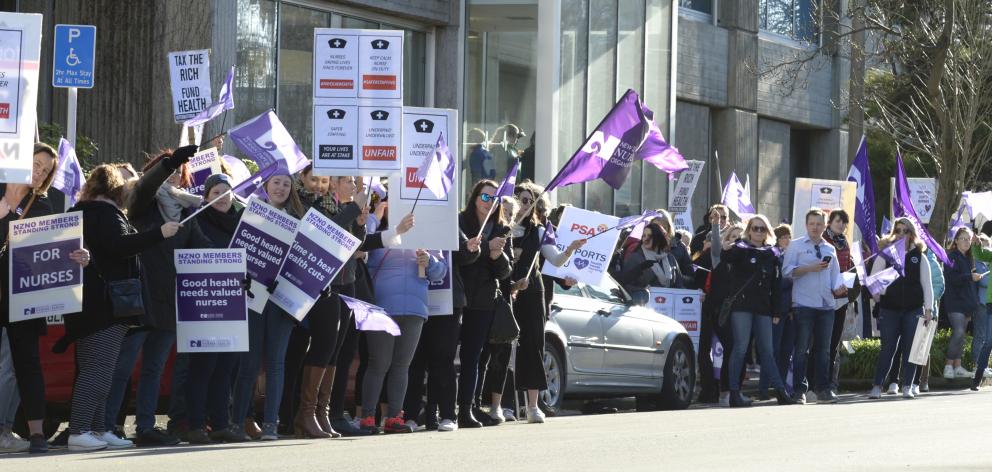 Nurses outside Dunedin Hospital as part of their 24-hour strike which began on July 12. Photo:...