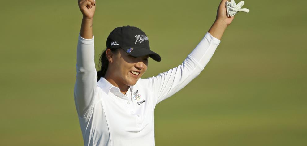 Lydia Ko celebrates her eagle on the 15th in the first round in Rio. Photo: Reuters 