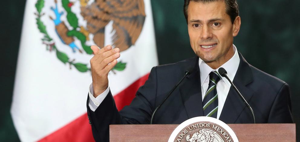 Mexico's President Enrique Pena Nieto says he'll work with Donald Trump. Photo: Reuters 