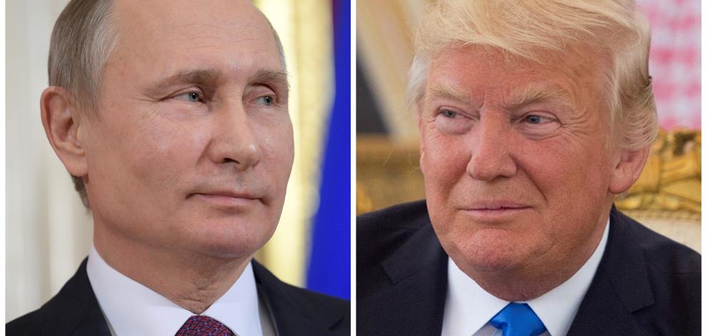 Donald Trump (right) says he hoped to meet with Vladimir Putin soon. Photo: Reuters 