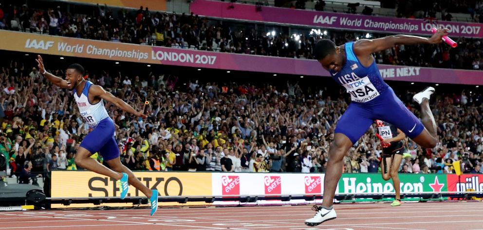 Nethaneel Mitchell-Blake of Great Britain (left) wins the race ahead of Christian Coleman of the...