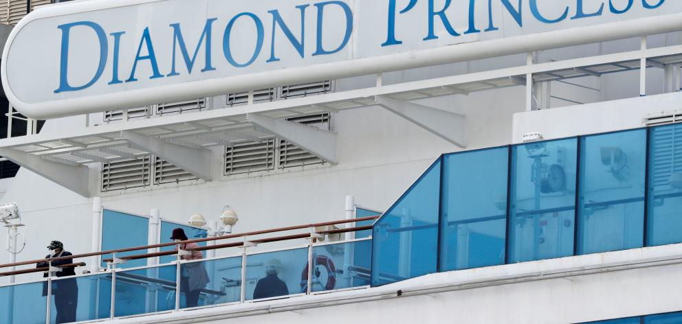 The Diamond Princess was placed in quarantine for two weeks upon arriving in Yokohama, south of...