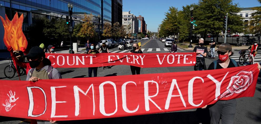 Activists take part in a protest led by shutdownDC in Washington. Photo: Reuters 