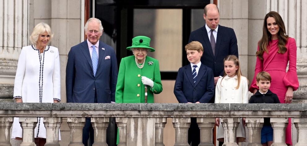 The Queen (centre) with, from left Camilla, Prince Charles, Prince George, Prince William,...