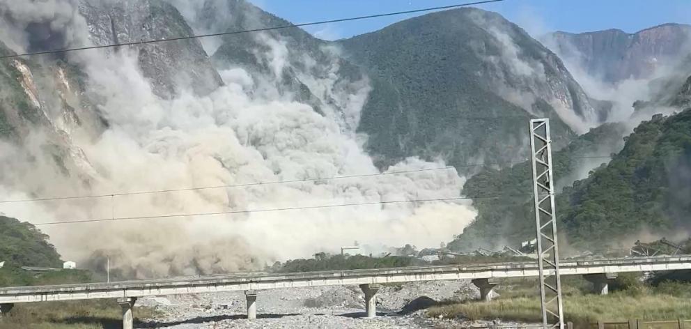 The quake caused a landslide in Xiulin in this image from video posted to social media. Image:...