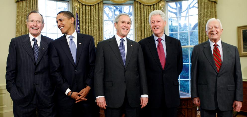 From left: US Presidents George H.W. Bush, Barack Obama, George W. Bush, Bill Clinton and Jimmy...