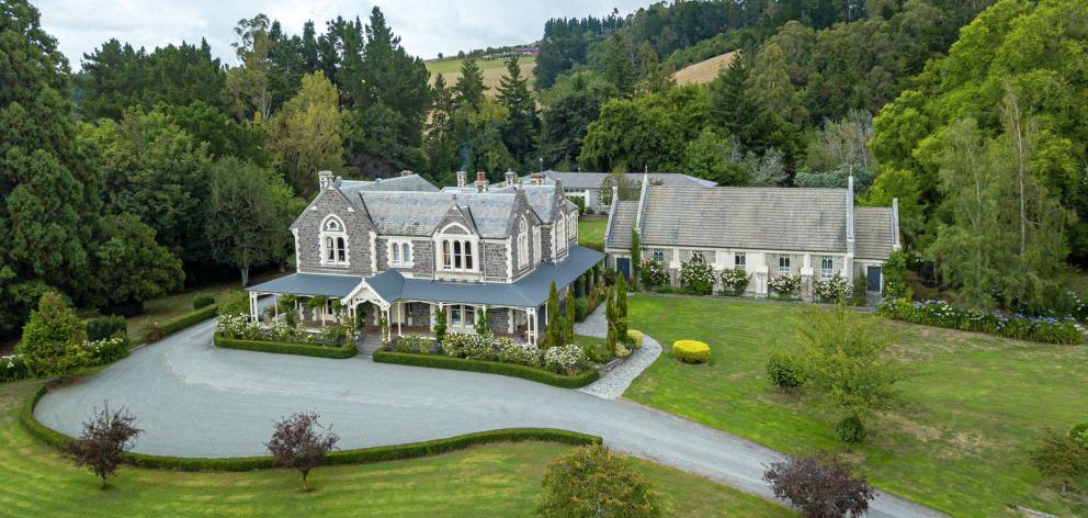 The property includes 11 hectares of park-like grounds, a main house with 10 bedrooms, two...
