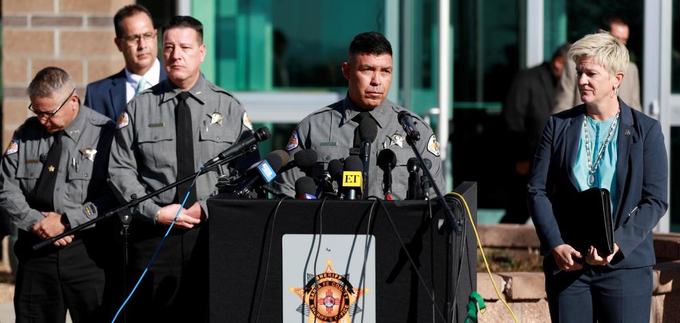 Santa Fe County Sheriff Adan Mendoza said it appears the same bullet struck the director and...
