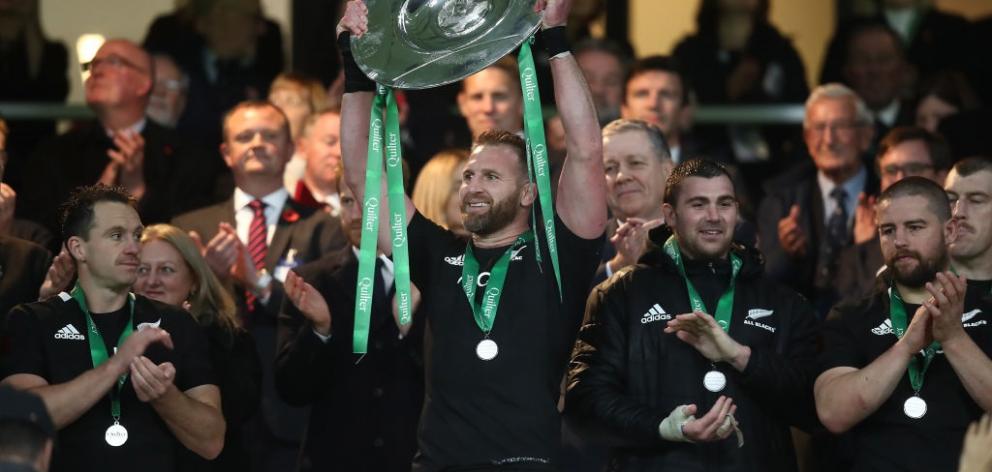 Captain Kieran Read lifts the Hillary Shield after the All Blacks' victory over England at...