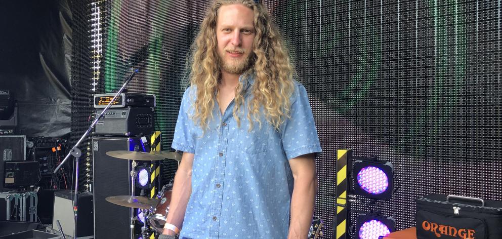 Bass Camp co-organiser Matt Turnball standing on the big stage. Photo: Laura Smith