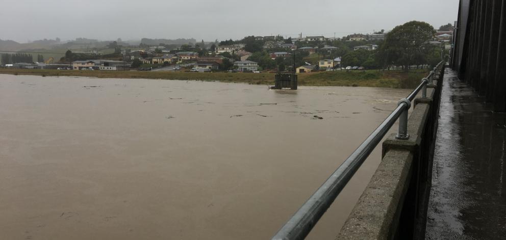 The Clutha River at Balclutha Bridge, about 9.10am, just having passed its second flood warning of 1680 cumecs. Photo: Richard Davison