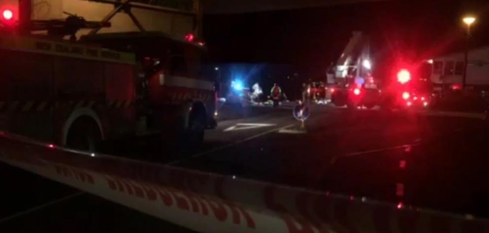 Witnesses say the car went through a roundabout and "straight into the drink" near Auckland...