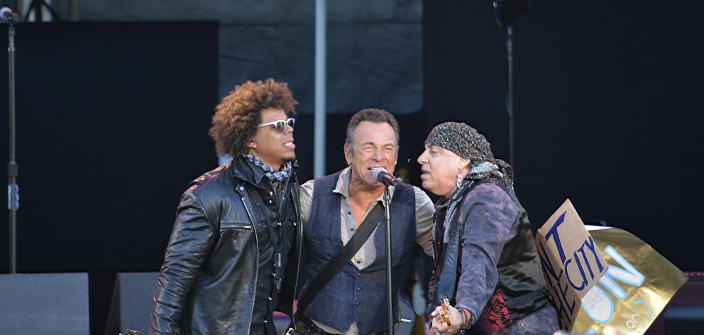Bruce Springsteen duelled vocals and guitars with his longtime guitarist Steven Van Zandt (right). 