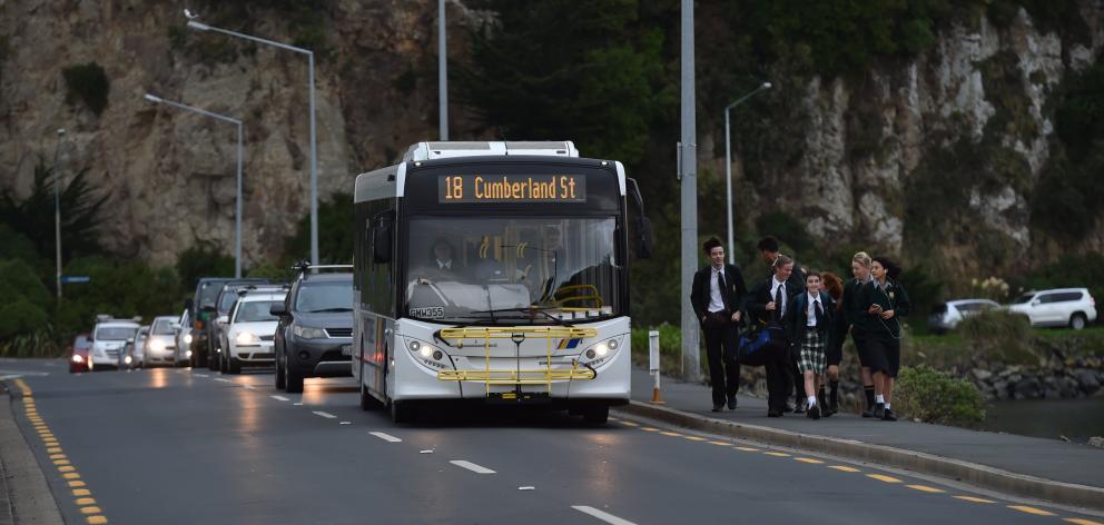 Bayfield High School pupils use the temporary bus stop on the Anderson’s Bay Inlet causeway in...