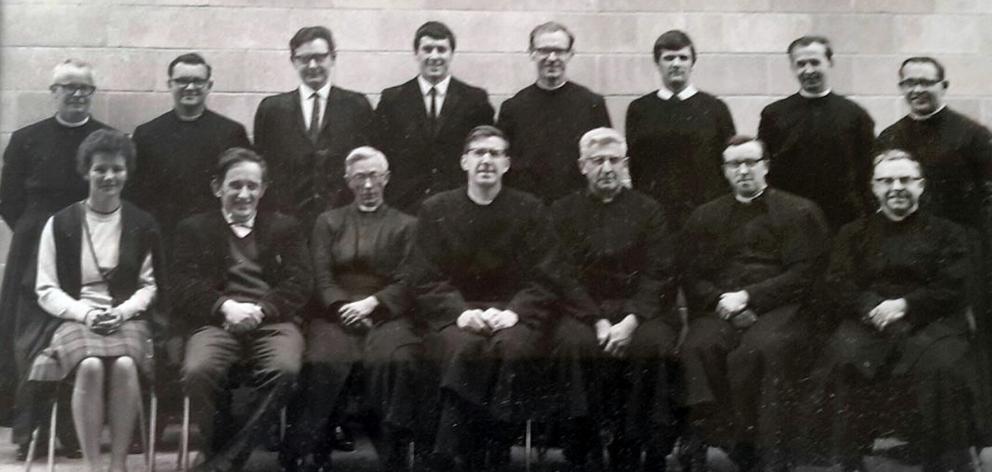 The St Paul's High School staff photograph from 1968, showing Magnus Murray (seated, second from...