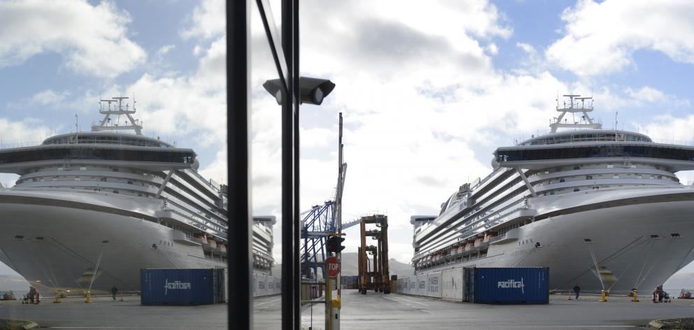 Golden Princess, the last vessel of the cruise ship season, mirrored in a window at Port Otago....