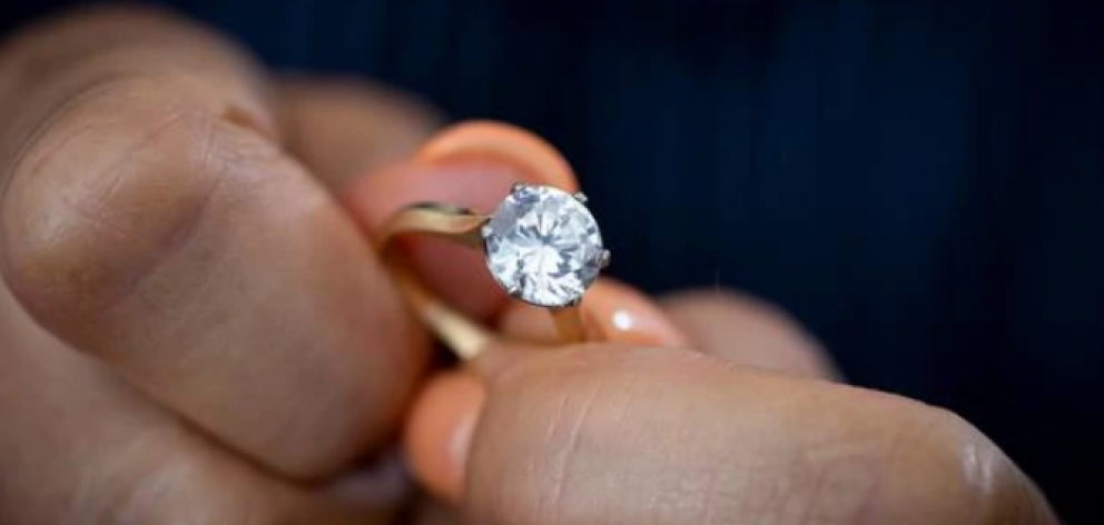 The ring that had been appraised in 2012 as a 9.3mm diamond solitaire of "very good" cut, on a...