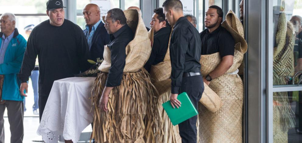 Pallbearers carry the casket of Jonah Lomu. Photo / Jason Oxenham