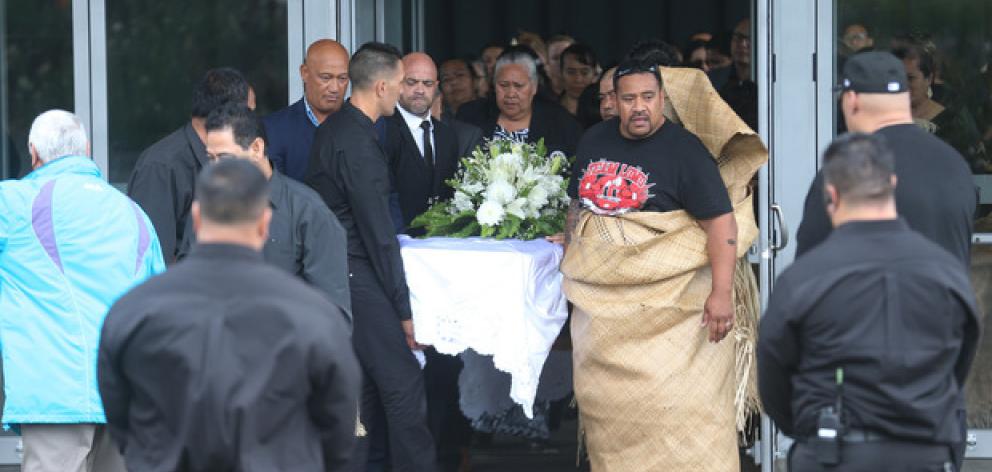 Jonah's casket leaves the service with the family following. Photo / Doug Sherring