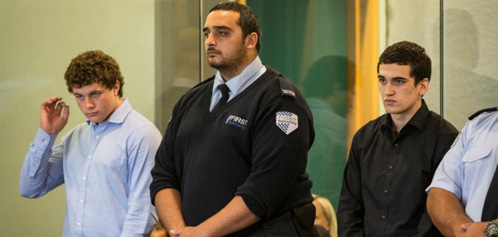 Leonard Nattrass-Berquist, left, and Beauen Wallace-Loretz, right, stand in the dock at the High Court at Auckland during their trial for the murder of Ihaia Gillman-Harris. Photo / Greg Bowker