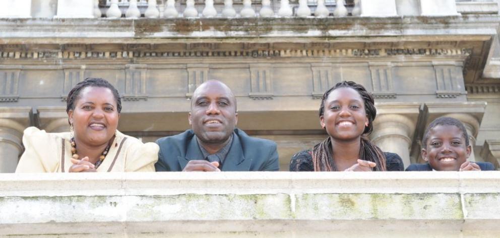 The Chuma family,  from Zimbabwe, (from left) Hellen (41), husband John (47) and children Adelaide (17) and Tapiwa  (10),pictured at the Dunedin Municipal Chambers after this week's citizenship ceremony. Photo by Linda Robertson.