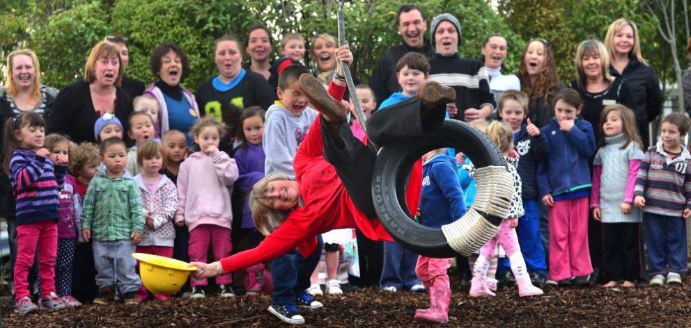 Retiring kindergarten teacher Bev Mackie holds on to the last few minutes of fun in a job she says she was born to do. Photo by Peter McIntosh. Retiring kindergarten teacher Bev Mackie holds on to the last few minutes of fun in a job she says she was born to do. Photo by Peter McIntosh.