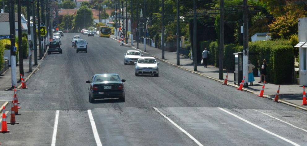 This section of North Rd, Dunedin, was sealed on Tuesday, only hours after new lane markings were painted on the road. Photo by Gerard O'Brien. 
